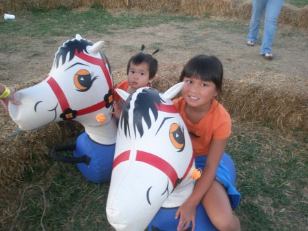 Kasen and Karis riding horses